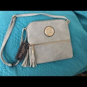 Gray crossover new never used purse